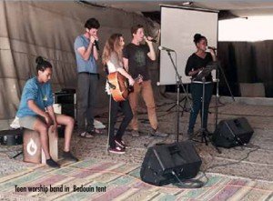 Teen worship band in Bedouin tent